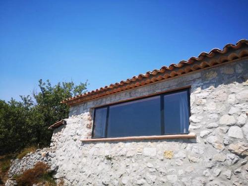 Le Cabanon de Gourdon bergerie rénové en pierre vue mer