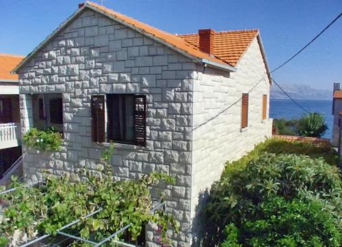  Apartments by the sea Postira, Brac - 9241 in Postira