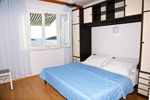 One-Bedroom Apartment with Balcony and Sea View