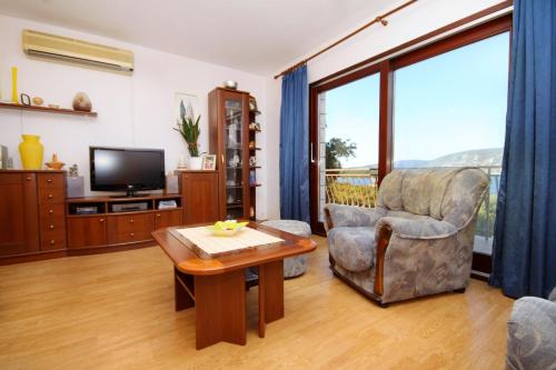Three-Bedroom Apartment with Terrace and Sea View