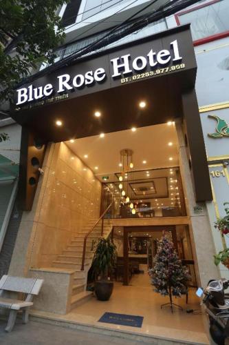 a restaurant with a sign on the front of it, Hotel Blue Rose in Haiphong