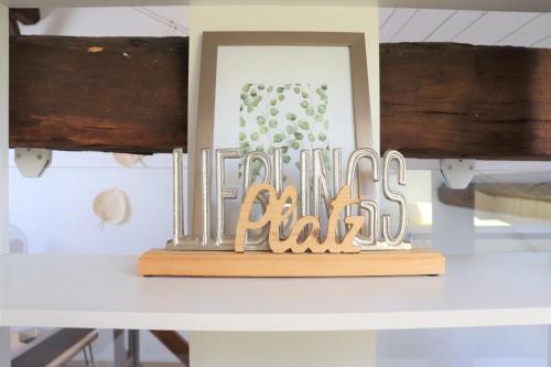 gedeelde lounge/tv-ruimte, Fereinwohnnung, Ferienhaus, Bauernhaus - 2 kostelnlose Parkplatze - Wifi - schoner Innenhof - 5min b in Saarlouis