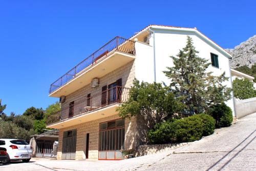  Apartments by the sea Marusici, Omis - 10012 in Mimice