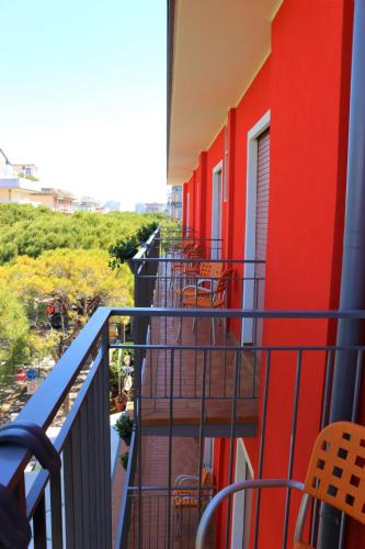 Camera quadrupla, balcone