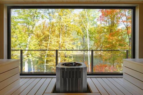 Chalet Flodhaus- Bord Rivière St-Maurice (navigable) / SPA /SAUNA - Chalets Galaxia (Chalet Flodhaus- Bord Riviere St-Maurice (navigable) / SPA /SAUNA - Chalets Galaxia) in Rivière-Matawin (QC)