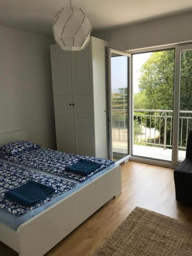 One-Bedroom Apartment with Balcony and Sea View image 10