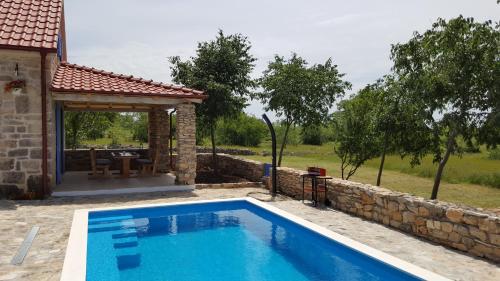 Family friendly house with a swimming pool Puljane, Krka - 11688