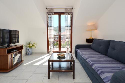Three-Bedroom Apartment with Balcony and Sea View