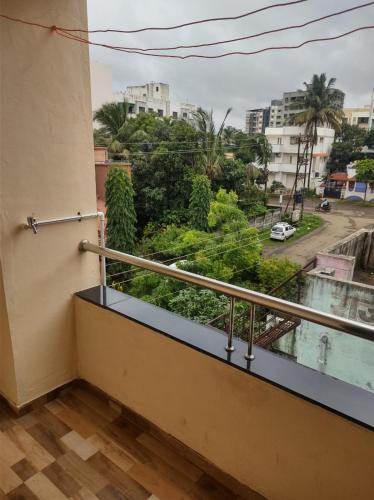 balkon/terras, 850m² 1 slaapkamer, 1 privé badkamer Appartement in Kamatwade (Shiv-Vatsalya Homestay) in Kamatwade