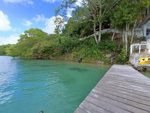 Casa Agua Bacalar / Naajil Ha