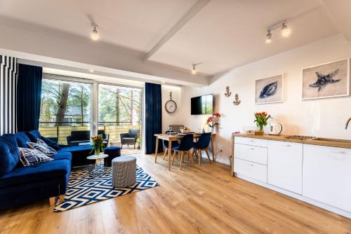 Apartament 21B Niebieskie Apartamenty Poddąbie z basenem krytym, odkrytym, salą zabaw, animacjami