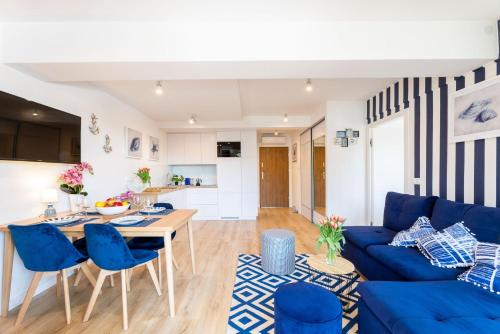 Apartament 21B Niebieskie Apartamenty Poddąbie z basenem krytym, odkrytym, salą zabaw, animacjami