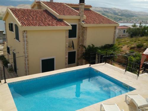 Family friendly apartments with a swimming pool Pag - 12795 - Location saisonnière - Pag