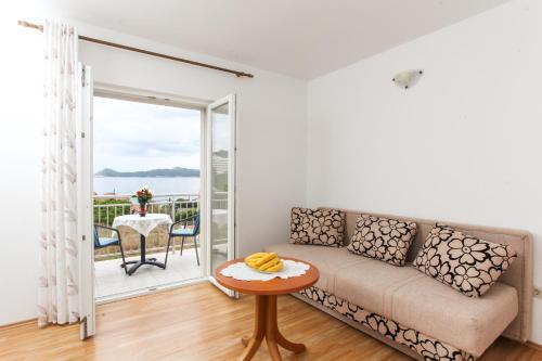 One-Bedroom Apartment with Balcony and Sea View