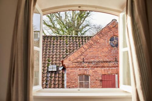 Skats, Gut Hohenstein - Meiereiappartment in Barkelsby