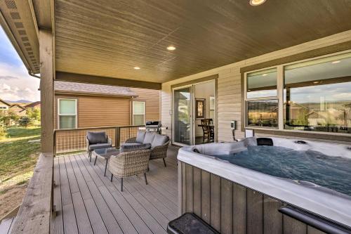 Chic Granby Home with Furnished Deck and Hot Tub!