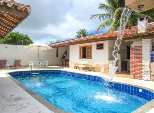 Casa com 4 Suítes, Piscina, Área Gourmet e Wifi