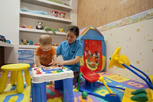 Kid’s club, Modena by Fraser Putuo Shanghai in Putuo and Changfeng Park