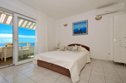 One-Bedroom Apartment with Balcony and Sea View