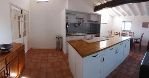 Exterior view, 3 bedroom modern apartment in historic building overlooking river herault in Agde City Center