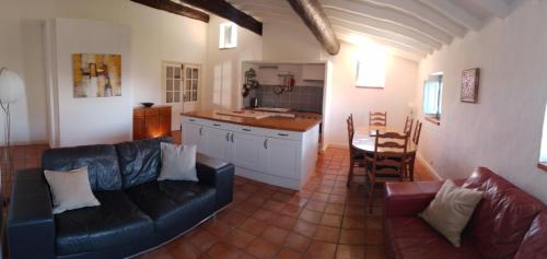 Exterior view, 3 bedroom modern apartment in historic building overlooking river herault in Agde City Center