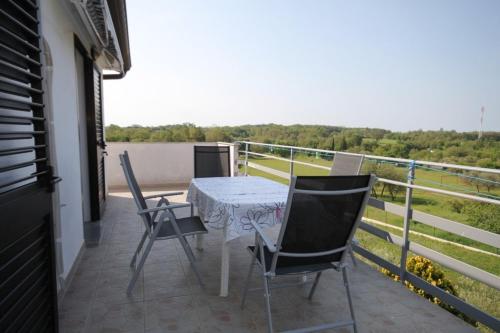 Erkély/terasz, Apartments and rooms with a swimming pool Babici, Umag - 3046 in Babici