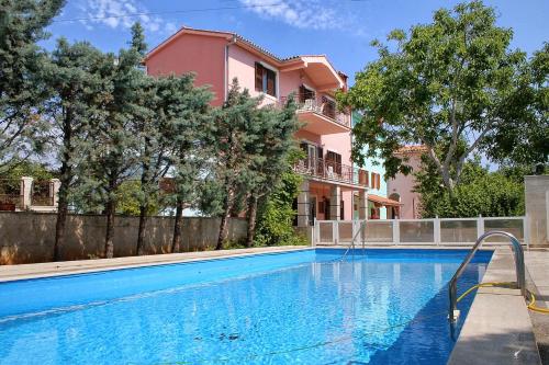 Family friendly apartments with a swimming pool Krnica (Marcana) - 3029 - Apartment - Krnica