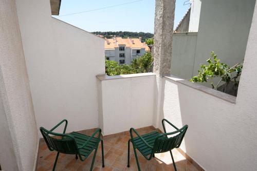 Apartments and rooms with parking space Palit, Rab - 3195