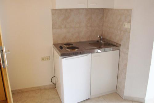 Apartments and rooms with parking space Palit, Rab - 3195