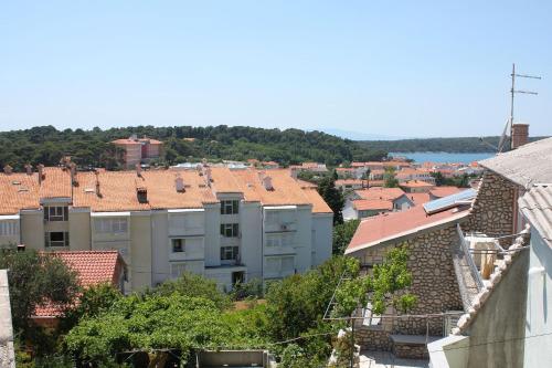 Apartments and rooms with parking space Palit, Rab - 3195