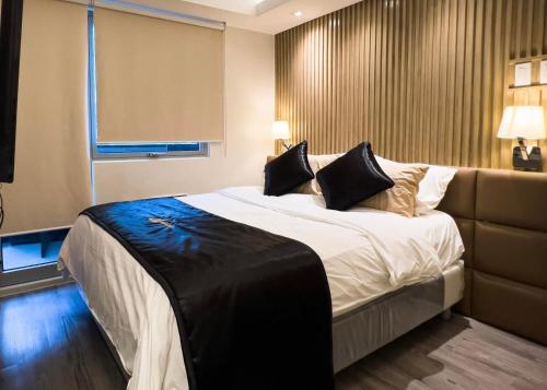 Nice one BR condo free pool in Commonwealth QC - Manila
