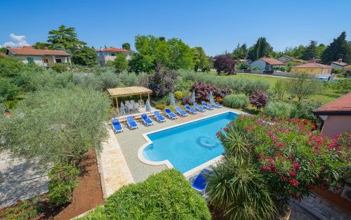 Family friendly apartments with a swimming pool Basanija, Umag - 3402