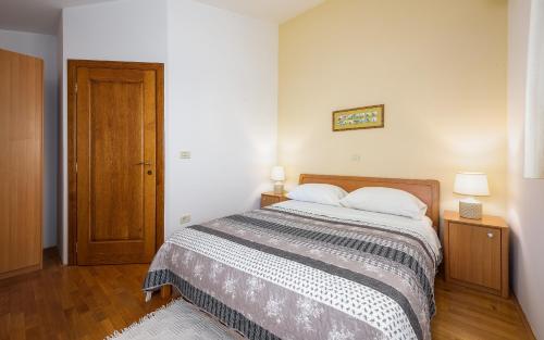 Family friendly apartments with a swimming pool Basanija, Umag - 3402