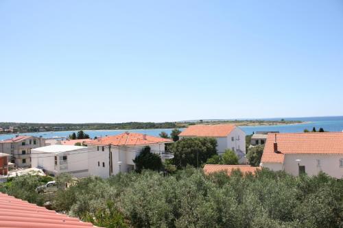 Apartments by the sea Novalja, Pag - 3307