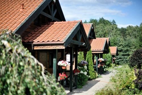 Domki Mazurskie w Ogrodach Złotej Łani Wiartel - Klimatyczne Apartamenty i Pokoje Widokowe