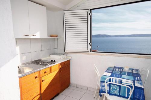 廚房, Apartments by the sea Igrane, Makarska - 5266 in 伊加勒
