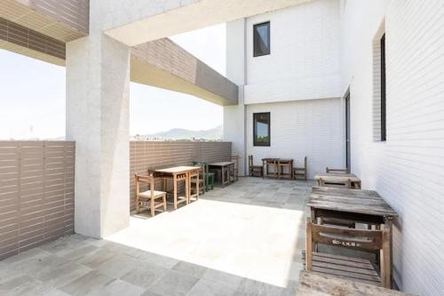 Pearl 150 Homestay - equipped with shared KTV, pool, mahjong and Switch - 발코니/테라스
