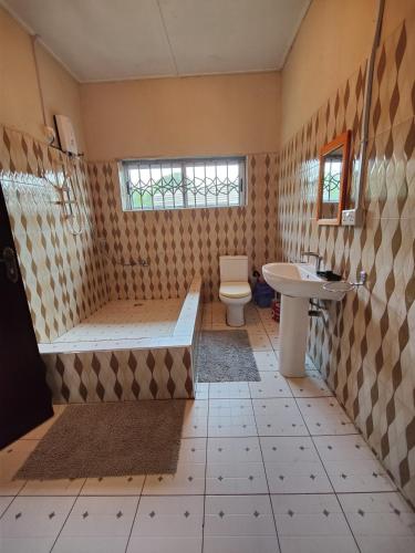 Baño, Tumi Hostel in Kumasi