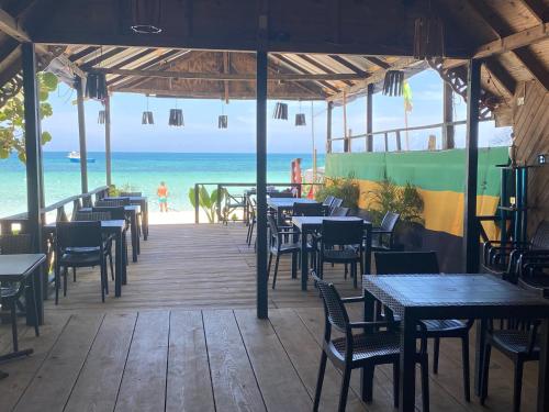Restaurant, Secret Cabins at Firefly Beach Cottage in Negril