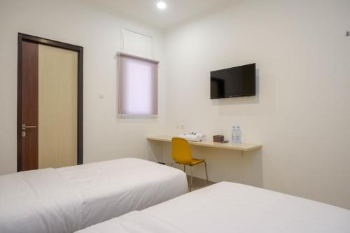Urbanview Hotel MS Rooms Inn Simpang Lima
