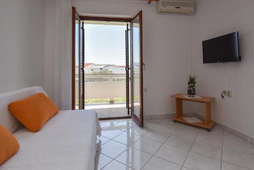 One-Bedroom Apartment with Balcony and Sea View