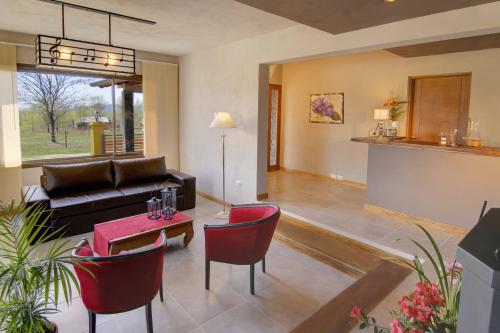 Shared lounge/TV area, Melodias Posada Boutique in Los Reartes