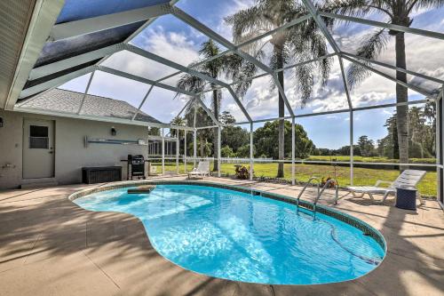 Palm Harbor Home with Pool and Golf Course Views! in Palm Harbor, USA
