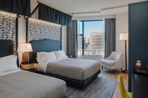 Premium Queen Room with Two Queen Beds and City View