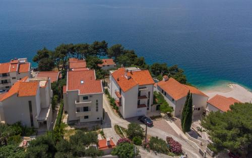  Apartments by the sea Medici, Omis - 1046 in Mimice