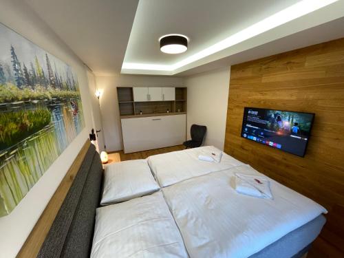 Luxusní apartmán GRAND v centru Harrachova se saunou, wallboxem EV, parkováním zdarma, Netflix a HBO, velkým balkonem a výhledem na Čertovu horu ,sjezdovku a skokanské můstky Luxusní apartmán GRAND v centru Harrachova se saunou, wallboxem EV, parkováním zdarma, Netflix a HBO, velkým balkonem a výhledem na Čertovu horu ,sjezdovku a skokanské můstky