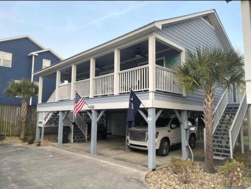 Beach house with pool only steps from the ocean.
