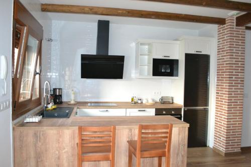 virtuve, Casa Rural La Madroña (Casa Rural La Madrona) in Fuenlabrada de los Montes