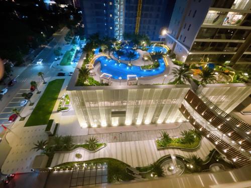 Three-Bedroom Apartment with Balcony room in The Sóng Vũng Tàu - Căn Hộ Hồ Bơi - Minh Thy's Homestay