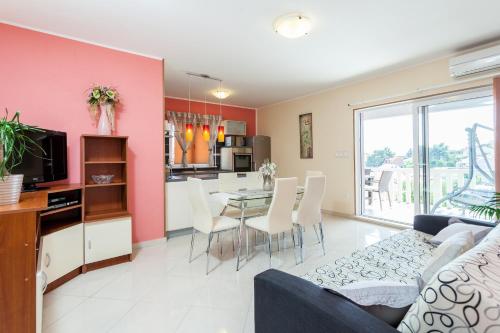 Three-Bedroom Apartment with Terrace and Sea View